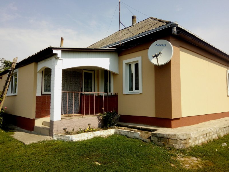 Утепляющие работы с черновым слоем утеплителя на фасаде